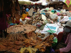 Fish at the market, right by the rubbish, eek!